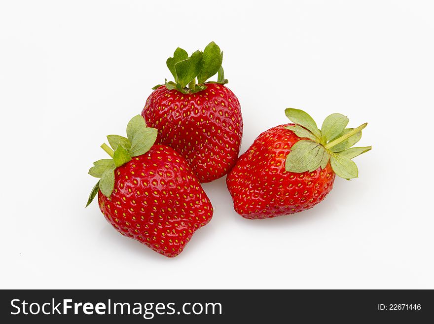 Appetizing ripe strawberry with green leaves. Appetizing ripe strawberry with green leaves