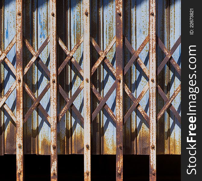 Abstract and pattern of rusty steel door