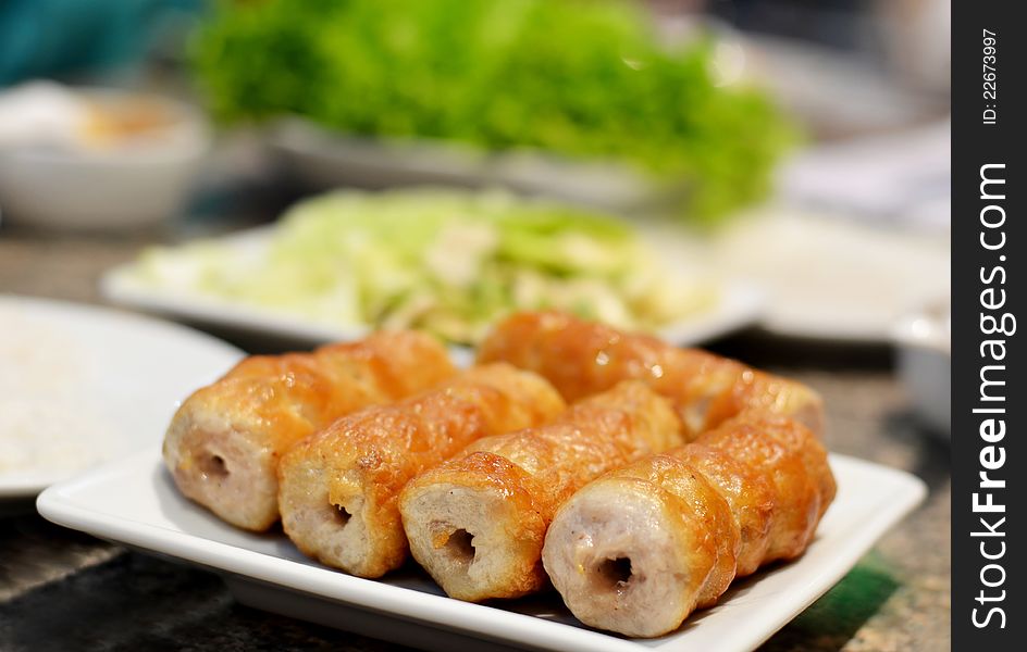 Grilled pork balls with condiments and Peanut Sauce. Grilled pork balls with condiments and Peanut Sauce