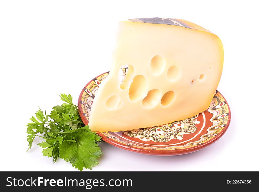 Cheese on white background ,green leaf