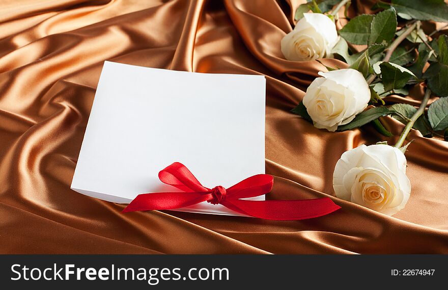 Card With White Roses On Golden Silk Background