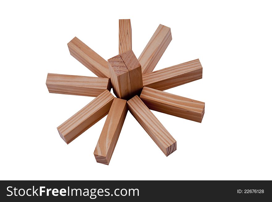 Wooden blocks make a sun or flower symbol isolated background