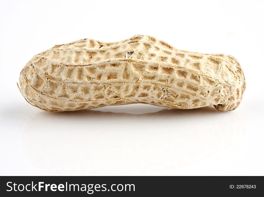 Closeup of a peanut with white background. Closeup of a peanut with white background.