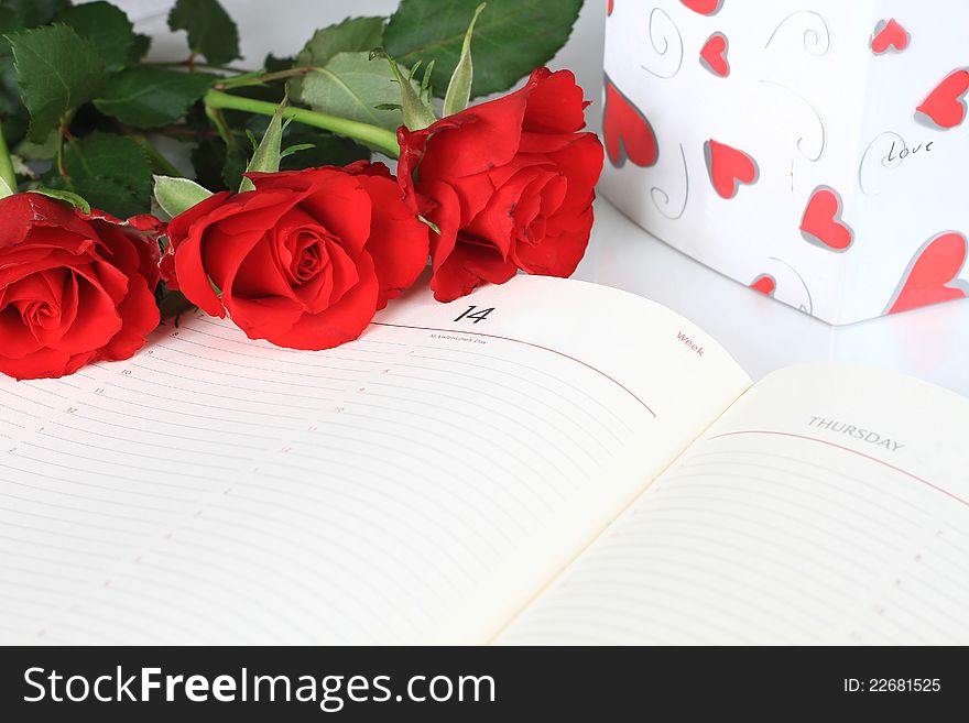 Image of a diary with red roses on valentines day