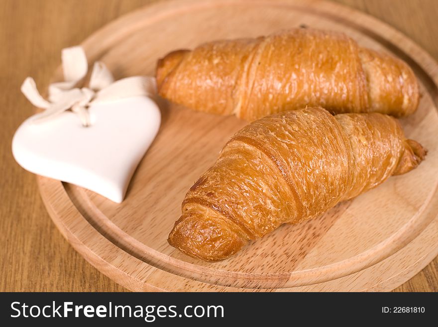 Two croissant for a delicious breakfast. Two croissant for a delicious breakfast
