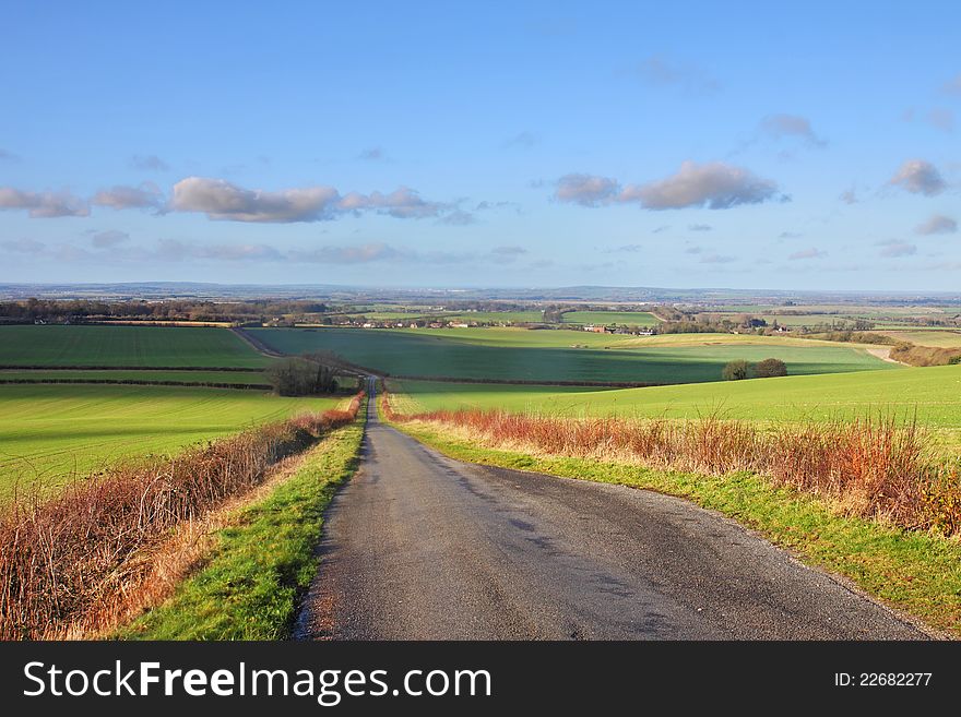 A Rural Landscape in the Chiltern Hills in Winter with Road between fields