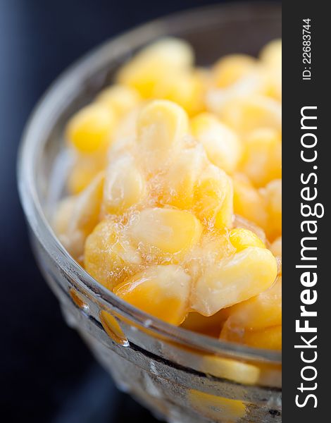 Close up of frozen sweet corn with some amount of ice