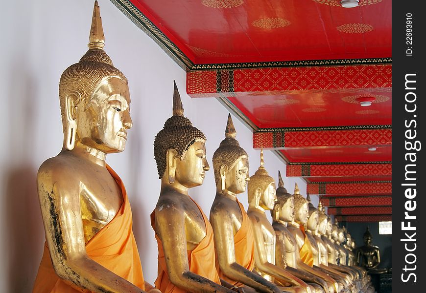 Buddha in corridor of light in wat pho temple,bangkok,