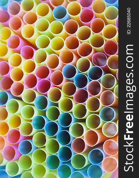 A rainbow assortment of drinking straws. A rainbow assortment of drinking straws.