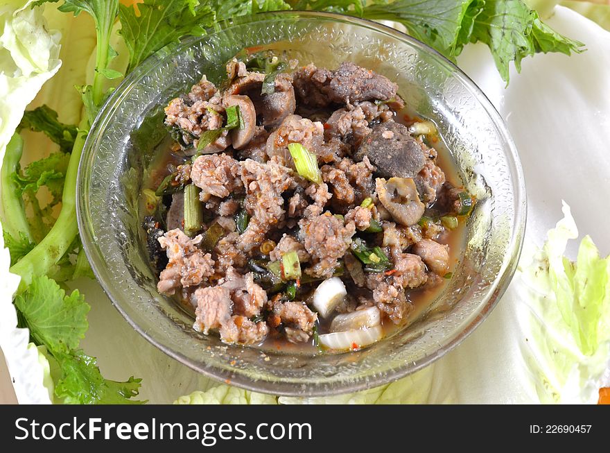 Thai dish of spicy minced pork eaten with vegetable. Thai dish of spicy minced pork eaten with vegetable