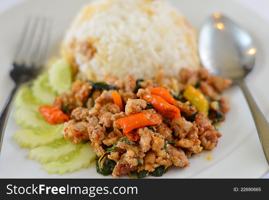 Rice and  minced pork fried with chili pepper and  sweet basil. Rice and  minced pork fried with chili pepper and  sweet basil