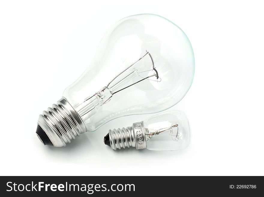 Two light bulbs on a white background