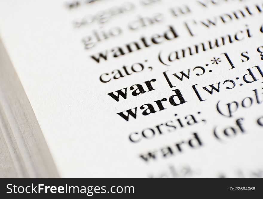 The word War from the dictionary - horizontal macro shot.