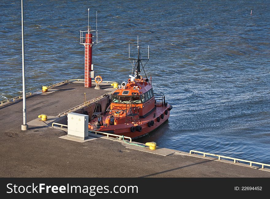 Orange Pilot boat in Virtsu harbour, Estonia. Orange Pilot boat in Virtsu harbour, Estonia