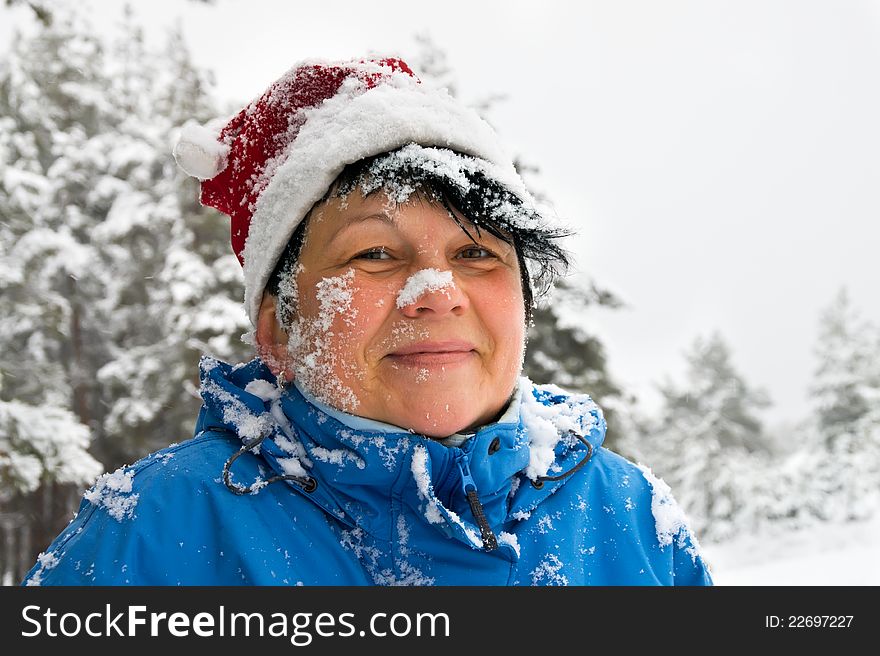 Woman sprinkled by a snow