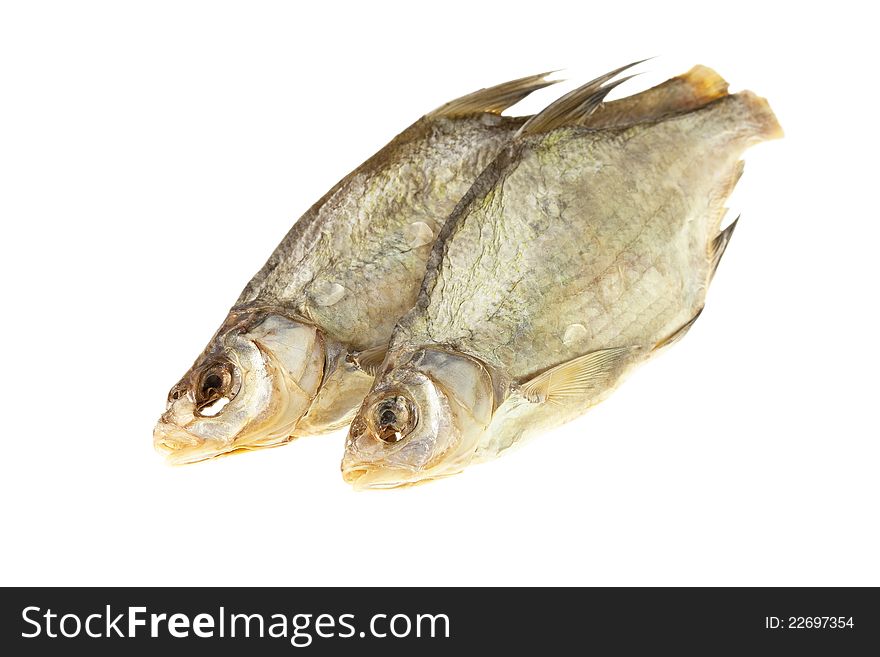 Two dried fishes. Isolated objects on a white background.