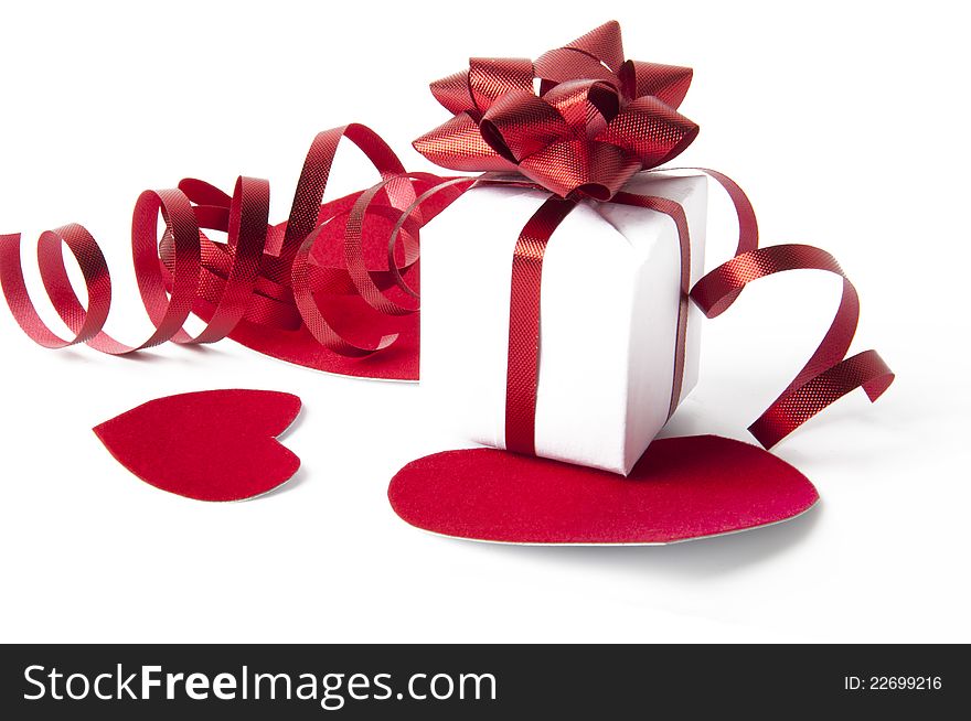 Very beautiful valentine, gift, and hearts on a white background. Very beautiful valentine, gift, and hearts on a white background