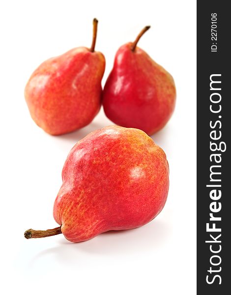 Red ripe Chinese pears on a glass table with reflection. Red ripe Chinese pears on a glass table with reflection