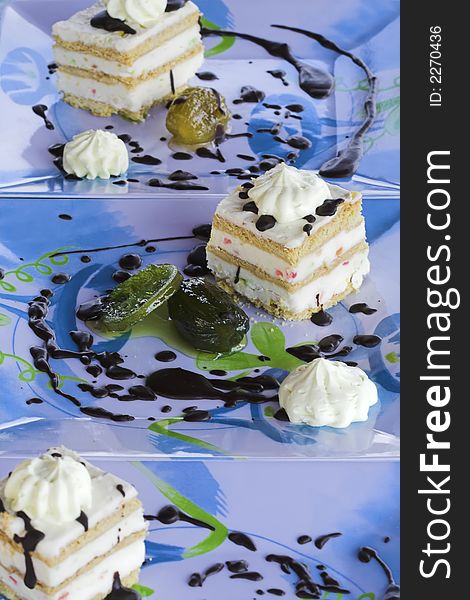White cream cake on a blue table