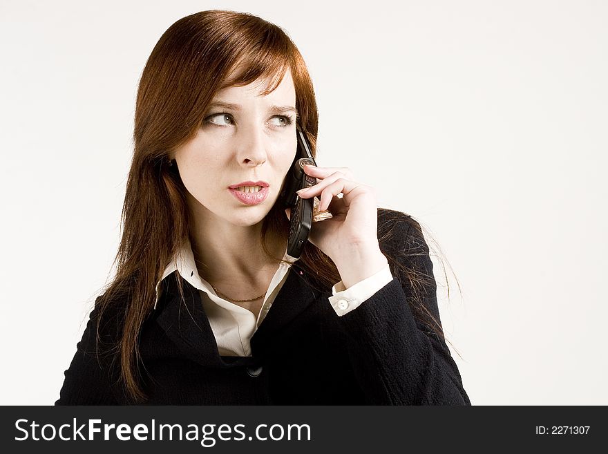 Young business girl talking with mobile phone