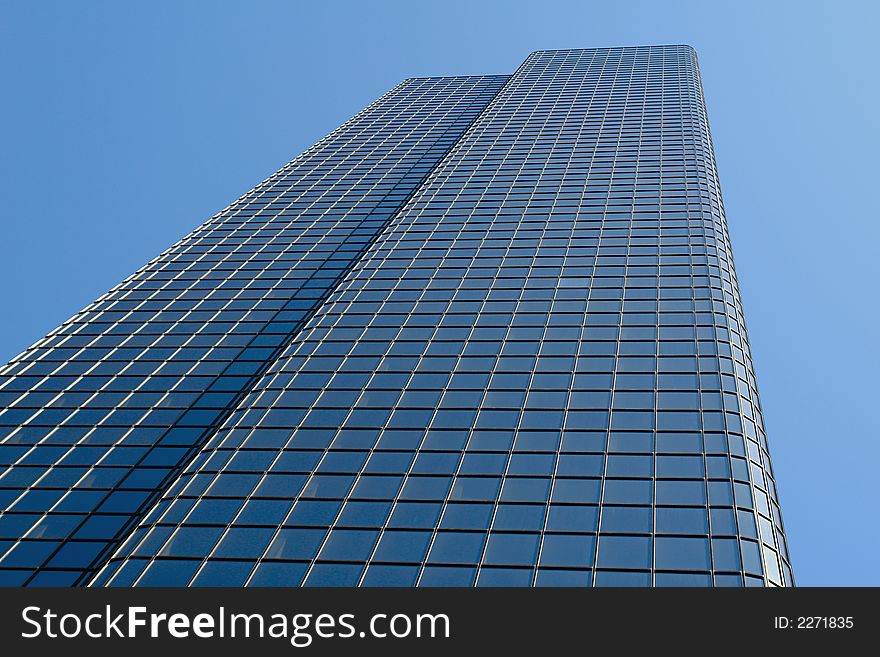 Tall skyscraper reaches for the sky in the back bay area of downtown boston. Tall skyscraper reaches for the sky in the back bay area of downtown boston