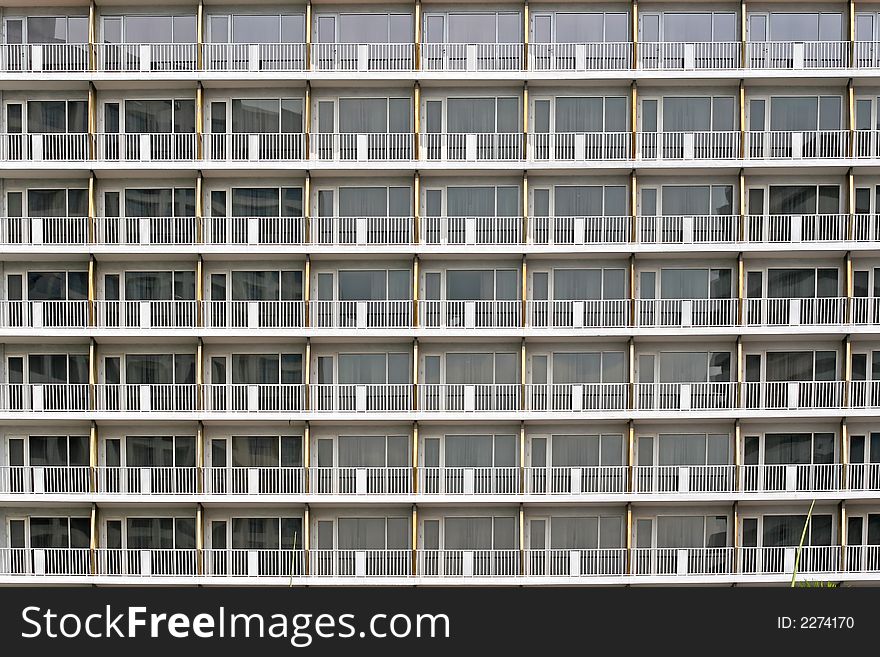 Rows of hotel rooms and balconies