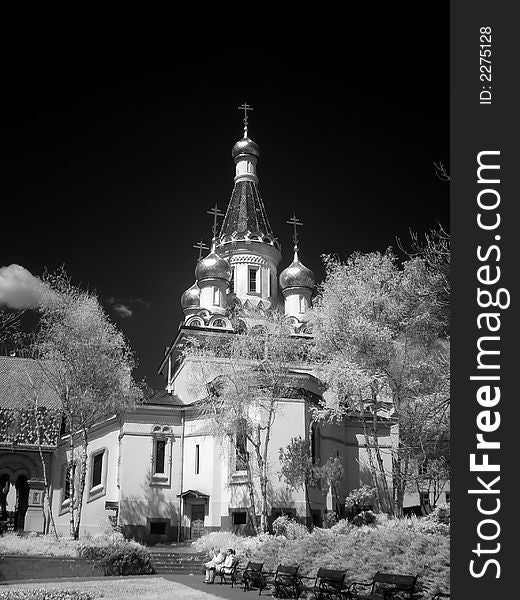 Church and trees in infrared mode. Church and trees in infrared mode