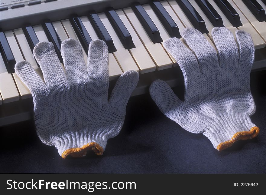 Playing the piano with the empty  gloves