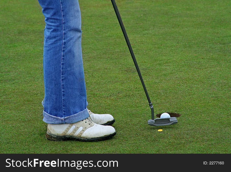 Woman Playing Golf