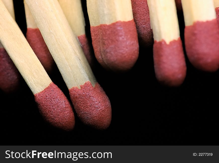 Close-up of group of matches, black background