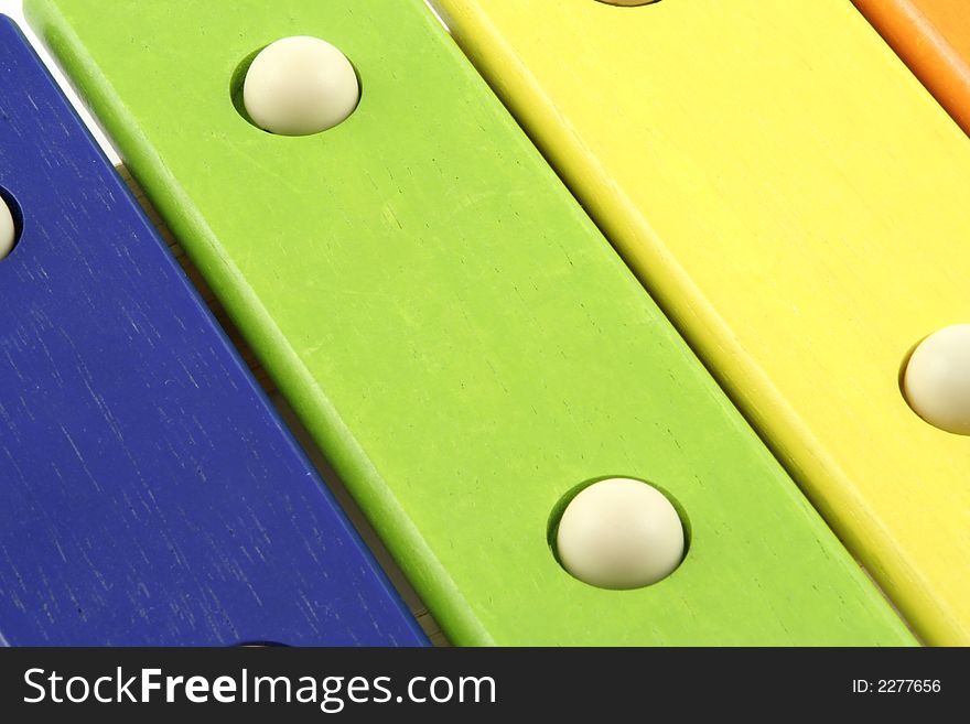 Childs colourful xylophone and beater