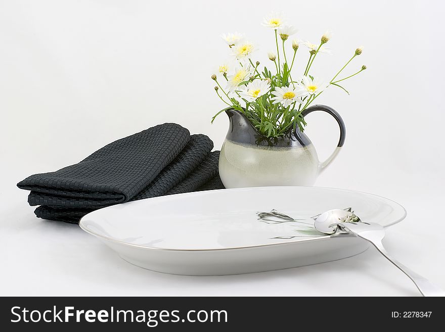 The table is dressed up with a cream pitcher filled with spring daisies and ready for the main course.  Fill with any thing you like. The table is dressed up with a cream pitcher filled with spring daisies and ready for the main course.  Fill with any thing you like.