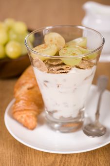 Muesli, Yoghurt, Croissants And Grapes Stock Image