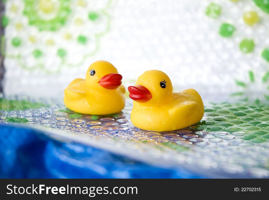 Two little yellow ducks for baby bath. Two little yellow ducks for baby bath