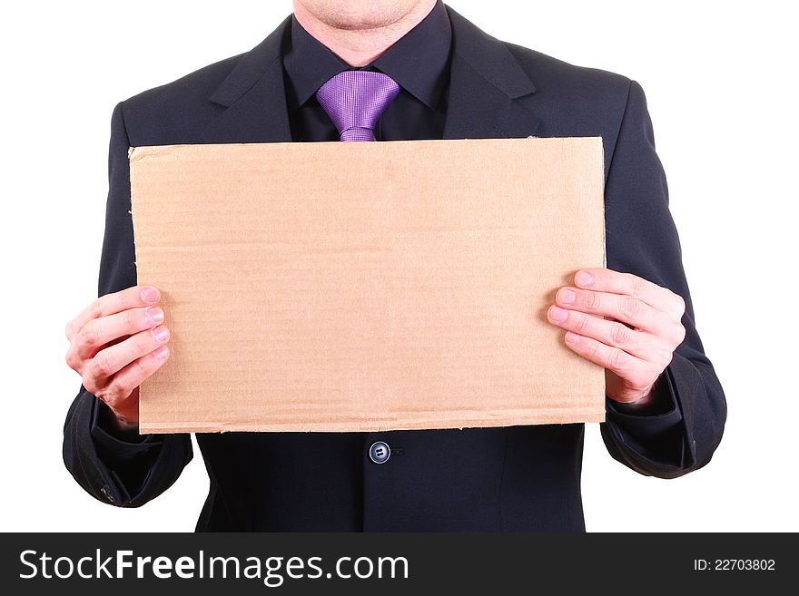 Businessman with blank cardboard sign in the hands