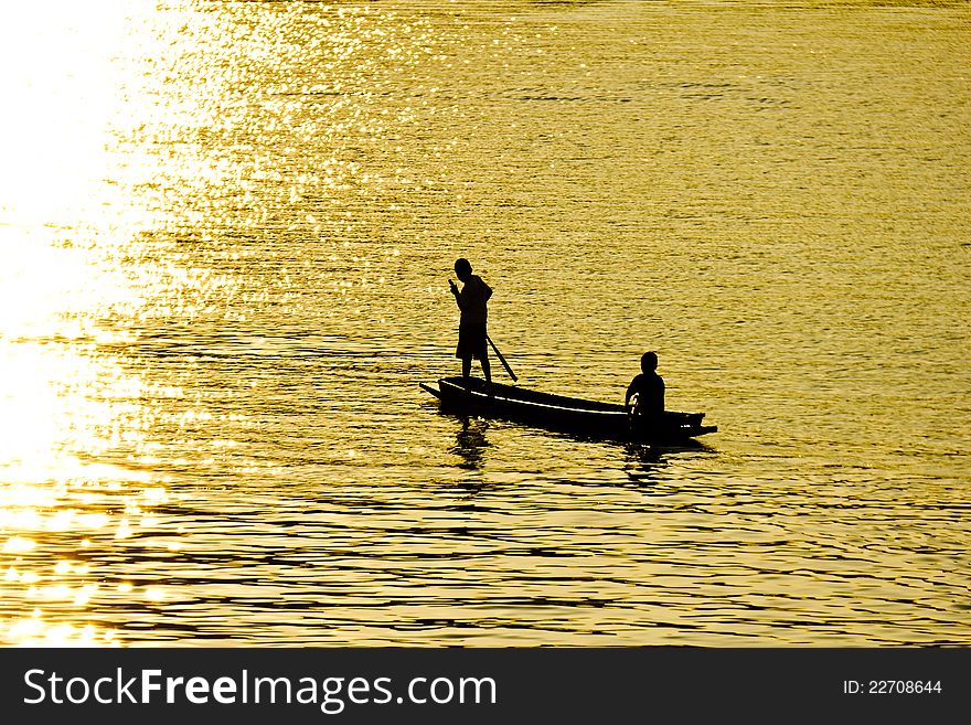 Two boys in a lonely boat