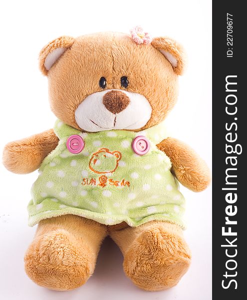 A brown teddy bear on white background