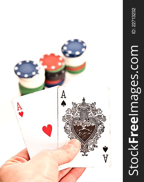 Woman hand holding poker king cards and chips on white background. Woman hand holding poker king cards and chips on white background