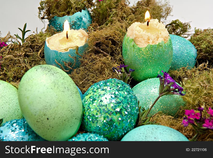 Easter decoration - green and blue dyed eggshell candles. Easter decoration - green and blue dyed eggshell candles.
