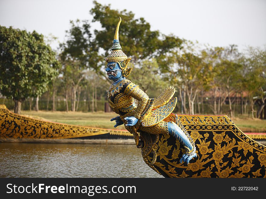 Human-birded warship floats on the river .