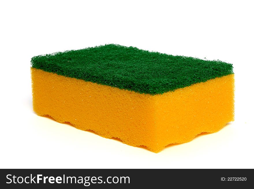 Yellow-green sponge for dish washing on a white background. Yellow-green sponge for dish washing on a white background