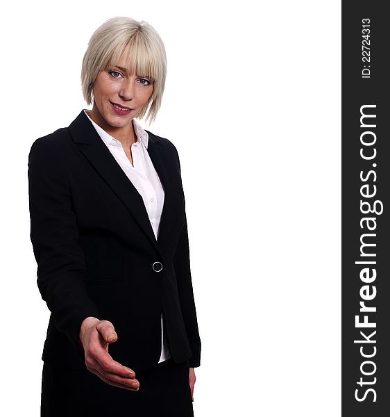 Young business woman ready to shake hands on white background with space to right.