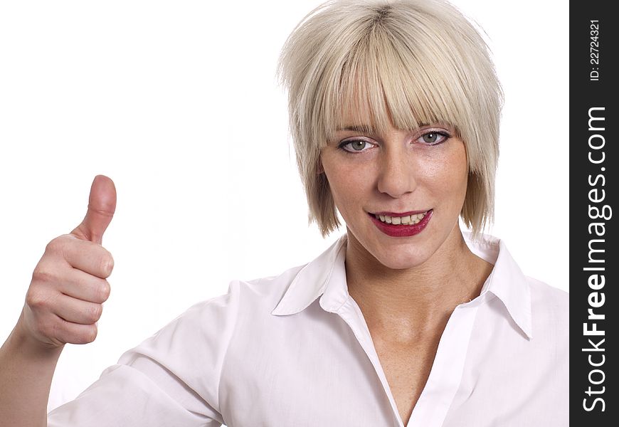 Young business woman with her thumb up against white background.