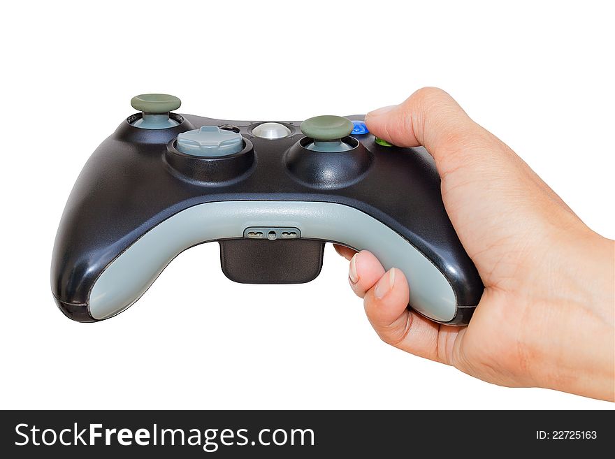 Video game controller in hand isolated on white background. Video game controller in hand isolated on white background