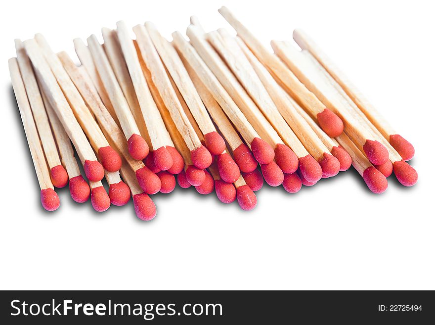 Closeup pile of matchsticks  on white