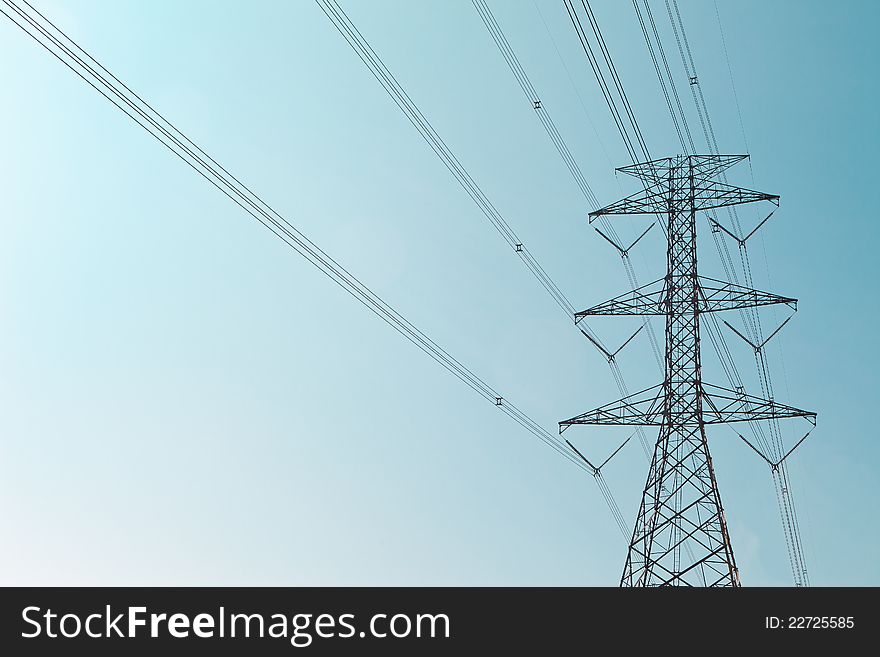 Image of high voltage post with nice sky