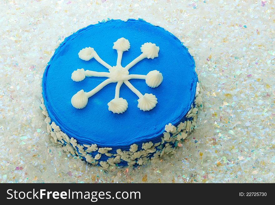 Snowflake Cake On Artificial Snow