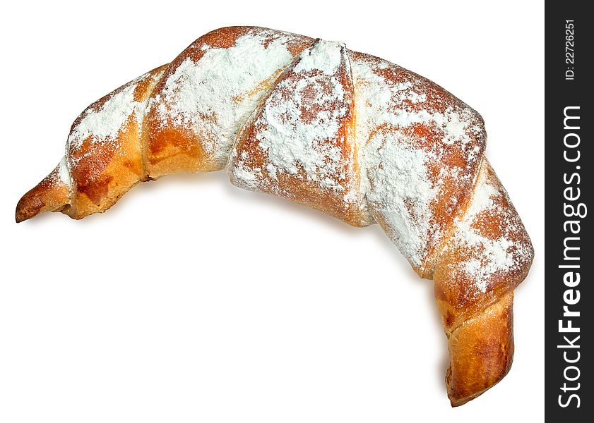 The big Italian croissant close up. It is isolated on a white background.