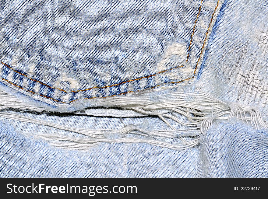 Old and torn jeans pocket.