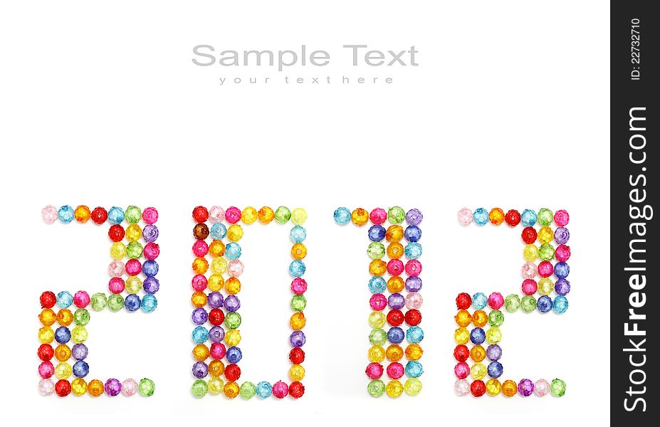 2012 made of colorful beads on white background